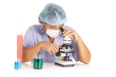 Doctor using microscope Stock Photos