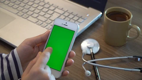 Doctor Using Phone With Green Screen Stock Footage 87103692