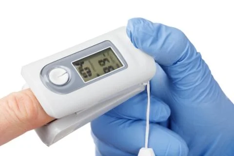 Doctor using pulse oximeter to check oxygen saturation of a person tracking c Stock Photos