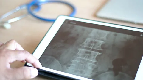 Doctor using  smart device Video stock 148608009