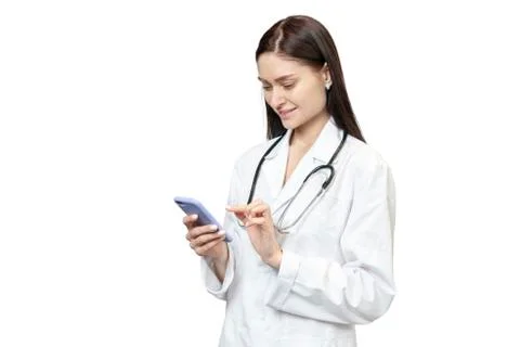 Doctor is using a smartphone Stock Photos