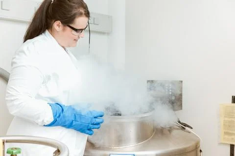 Doctor using sterilizing machine Stock Photos
