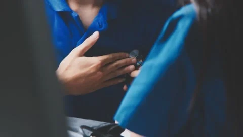 Doctor using a stethoscope checking patient with examining, presenting resu.. Stock Footage 344529470
