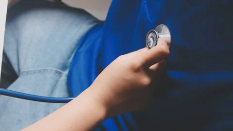 Doctor using a stethoscope checking patient with examining, presenting resu.. Stock Footage 344529516