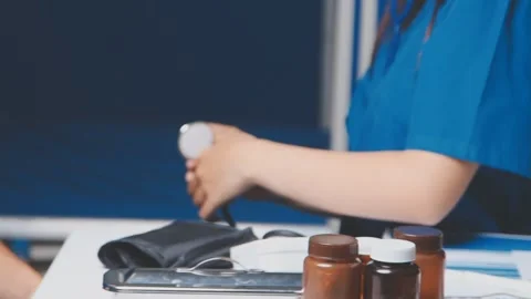 Doctor using a stethoscope checking patient with examining, presenting resu.. Stock Footage 344529518