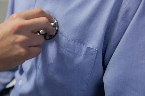 Doctor using stethoscope checking patient chest close up healthcare concept Stock Photos