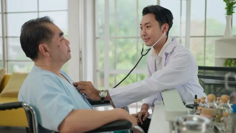 Doctor using stethoscope listen elderly patient heartbeat, talking for check up. Stock Footage 265995348
