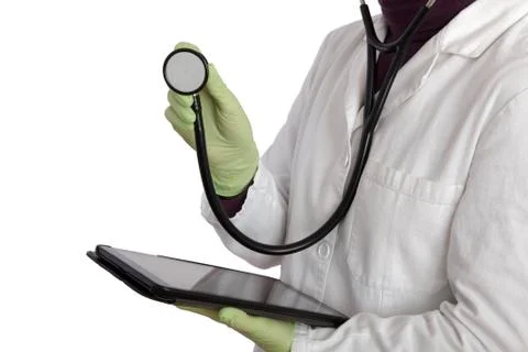 Doctor using sthetoscope and tablet Stock Photos