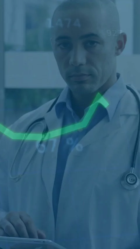 Doctor using tablet with financial data animation over hospital background Stock Footage 343615874