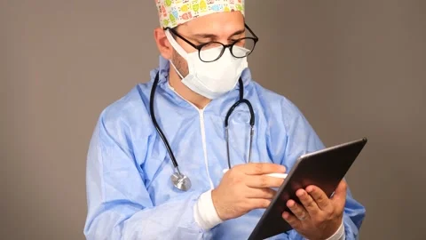 Doctor using tablet Stock Footage 247339952
