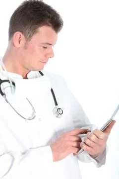 Doctor using a tablet Stock Photos