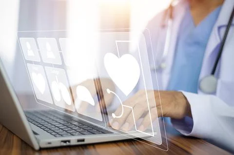 Doctor using technology document management on computer system management f.. Stock Photos