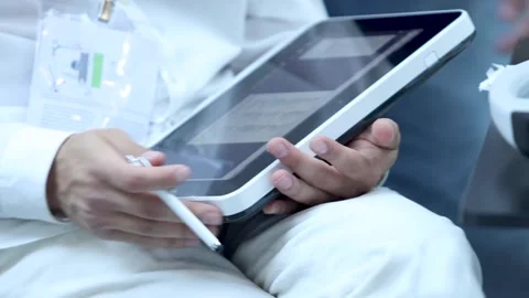 Doctor using ultrasound device based on portable tablet computer Stock Footage 162620879