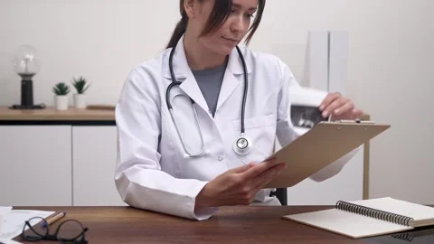 Doctor video call screen talking to web camera consulting virtual patient online Stock Footage 293618993