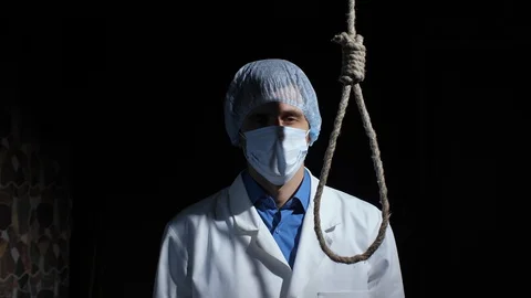 Doctor wants to commit suicide Stock Footage 129518147
