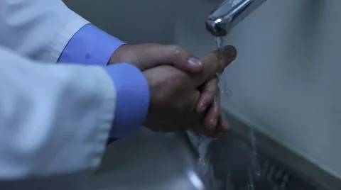 Doctor washes his hands Stock Footage 41755076