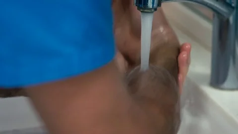 Doctor washes his hands Stock Footage 73260581