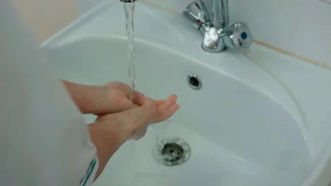 The doctor washes his hands Stock Footage 74335686