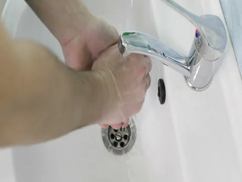 A doctor washes his hands before surgery. Stock Footage 73381244