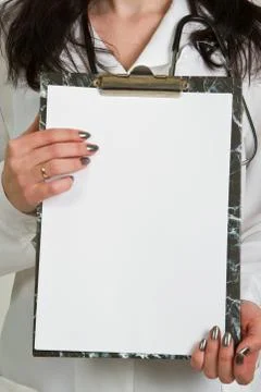 Doctor whit notepad Stock Photos