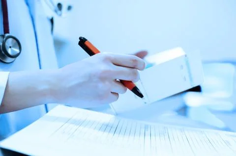 The doctor will be note Stock Photos