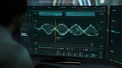 The doctor is working on the computer. The DNA strand is being analyzed. UI. Vídeo Stock 150908320