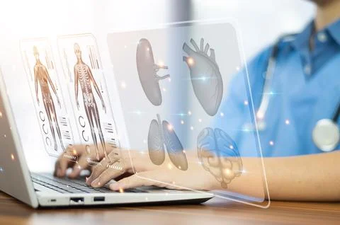 Doctor working with laptop computer  and Doctor using computer checking dat.. Foto stock