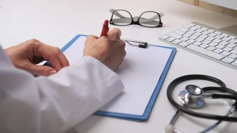 Doctor working in office Stock Footage 93435996