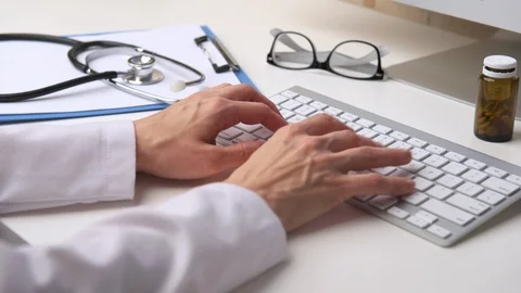 Doctor working in office Stock Footage 93436040
