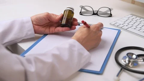 Doctor working in office Video stock 93438612