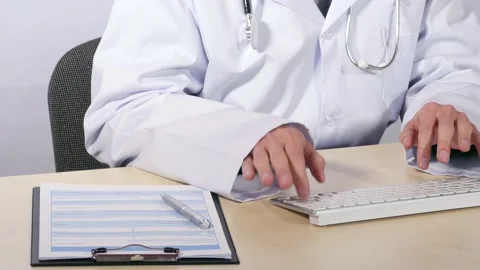 Doctor working in office Stock Footage 236285811