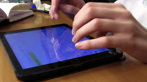 Doctor Working On Tablet Computer Видео 48306717