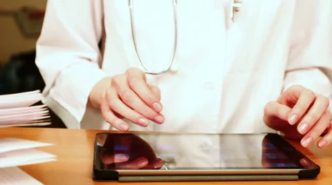 Doctor Working On Tablet Computer Stock Footage 54601933