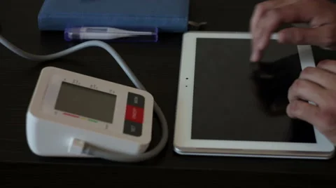 Doctor works on the tablet Stock Footage 66760076