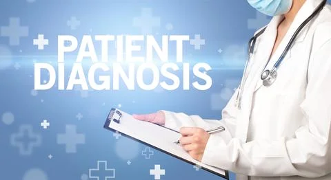 Doctor writes notes on the clipboard Stock Photos