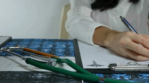 The doctor writes notes Stock Footage 89832729