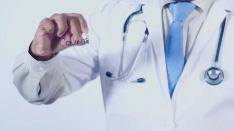 A doctor writes on the screen words Counting calories Stock Footage 248569182
