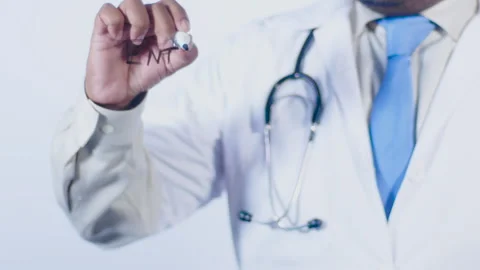 A doctor writes on the screen words Enterocytes Stock Footage 248542639