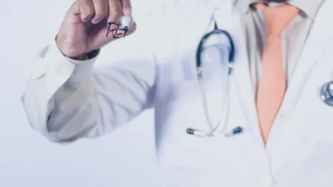 A doctor writes on the screen words Penis envy Stock Footage 248558903