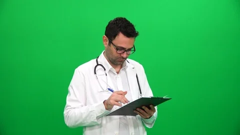 Doctor Writing On Clipboard Видео 88651996
