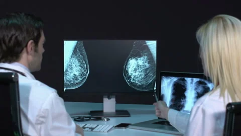 Doctors analysing mastography Stock Footage 210623791