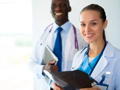 Doctors analyzing an x-ray in a meting Stock Photos