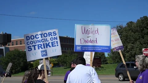 Doctors and hospice nurses strike at Allina Health's Mercy Hospital in Minnesota Stock Footage 345762884