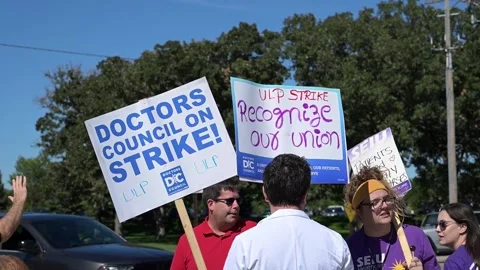 Doctors and hospice nurses strike at Allina Health's Mercy Hospital in Minnesota Stock Footage 345762924