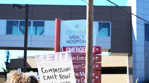 Doctors and hospice nurses strike at Allina Health's Mercy Hospital in Minnesota Stock Footage 345762936