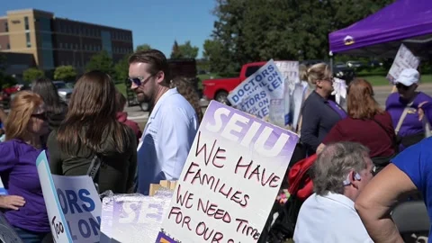 Doctors and hospice nurses strike at Allina Health's Mercy Hospital in Minnesota Stock Footage 345762969