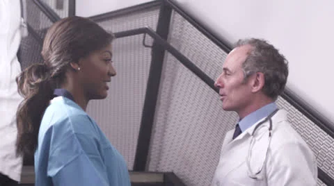 Doctors and nurse using digital tablet Stock Footage 24278317