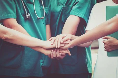 Doctors and nurses coordinate hands. Concept Teamwork Stock Photos
