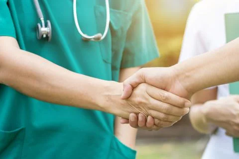 Doctors and nurses coordinate hands. Concept Teamwork Stock Photos