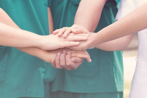 Doctors and nurses coordinate hands. Concept Teamwork Stock Photos
